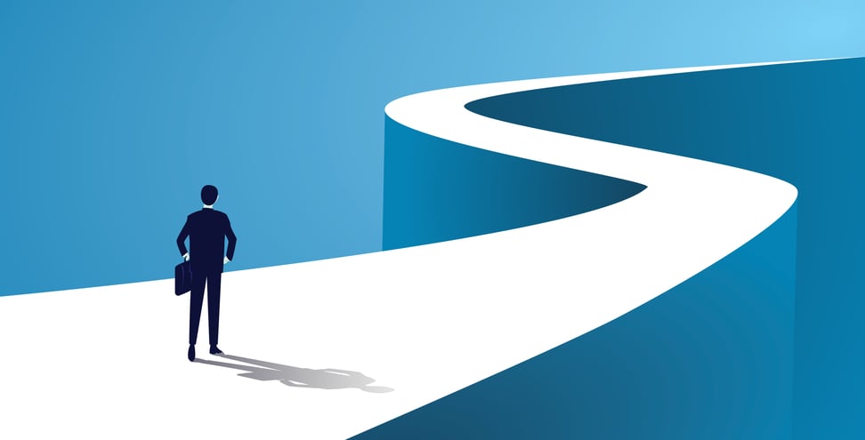 Business journey, businessman walking on long winding path going to success in the future concept.