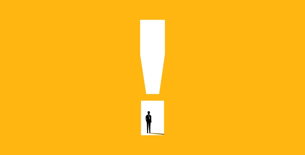 Business caution, warning. Businessman in exclamation mark. Yellow Background.